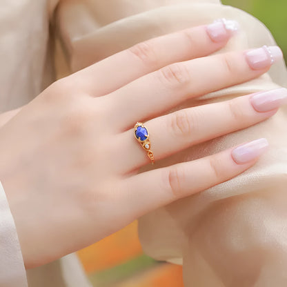 Japanese style lapis lazuli ring with sterling silver ellipse setting and adjustable sizing