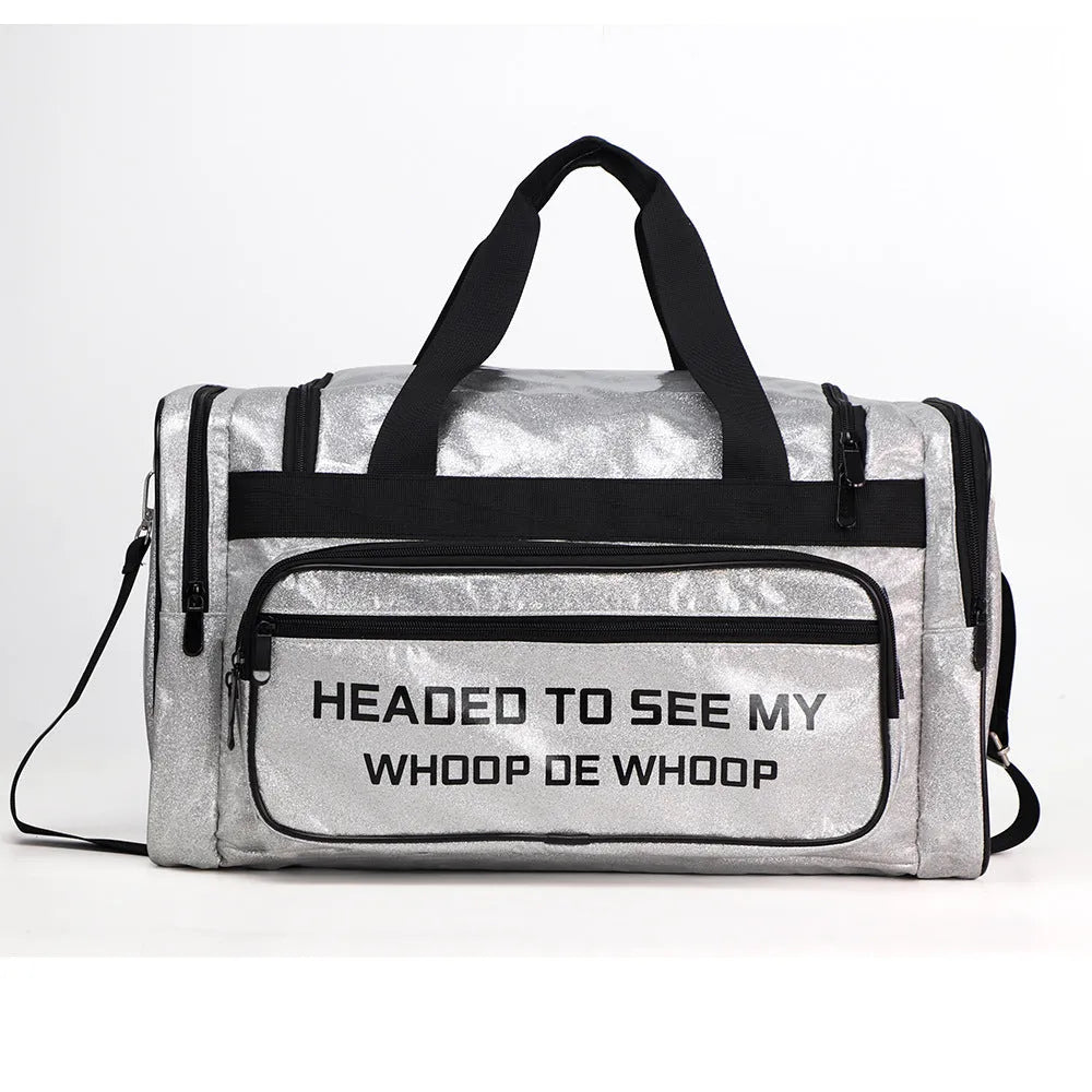 Large silver PU leather sports handbag with letter detailing, showing internal compartments.