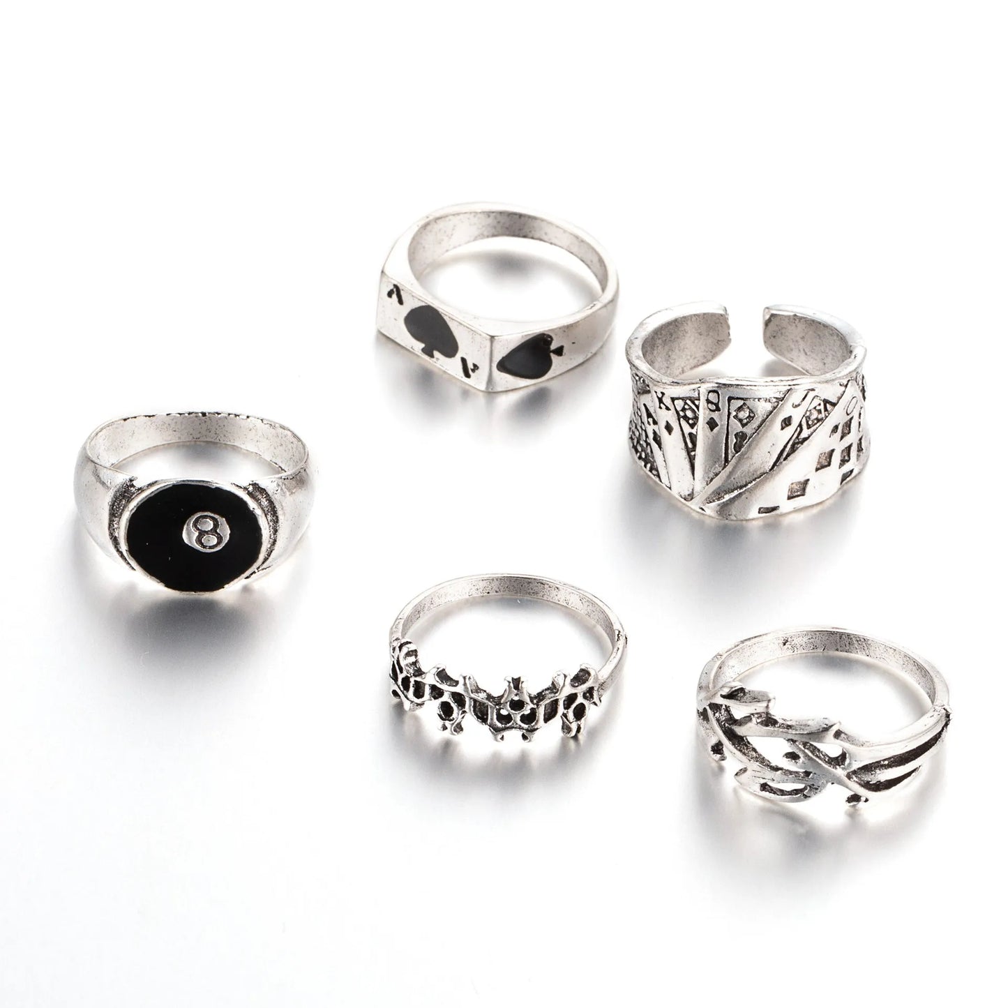 Adjustable black alloy ring with a large raised poker spade motif on a finger.