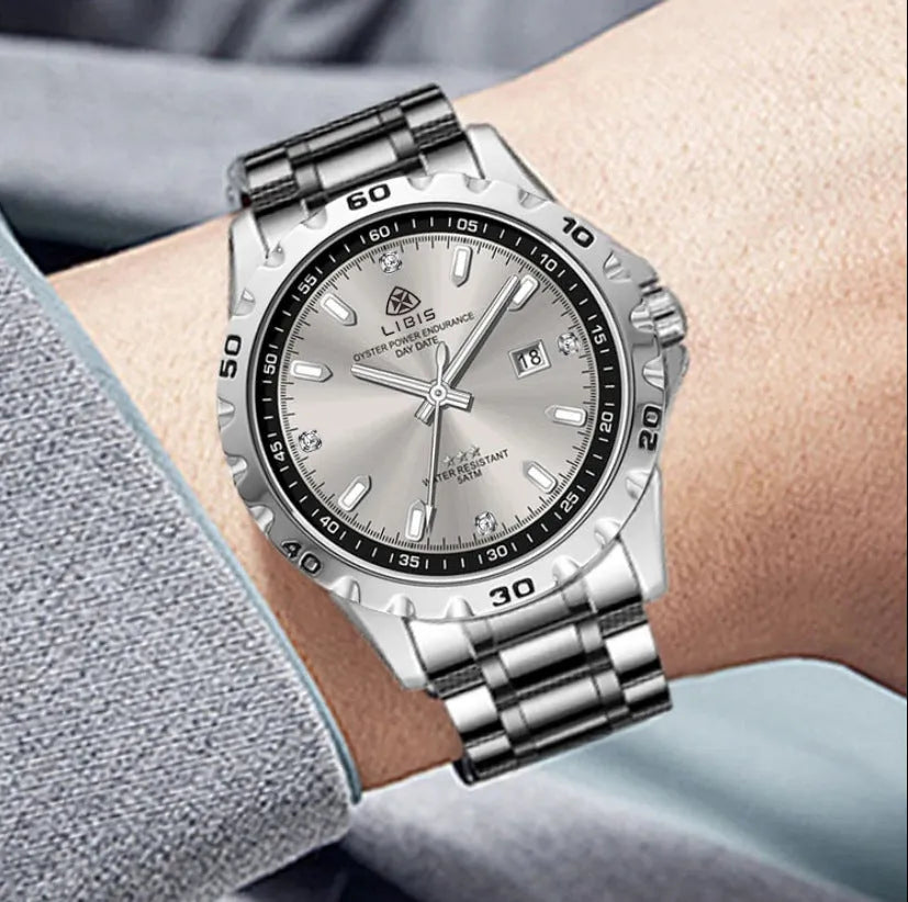 Silver men's waterproof watch with stainless steel strap and luminous grey dial.
