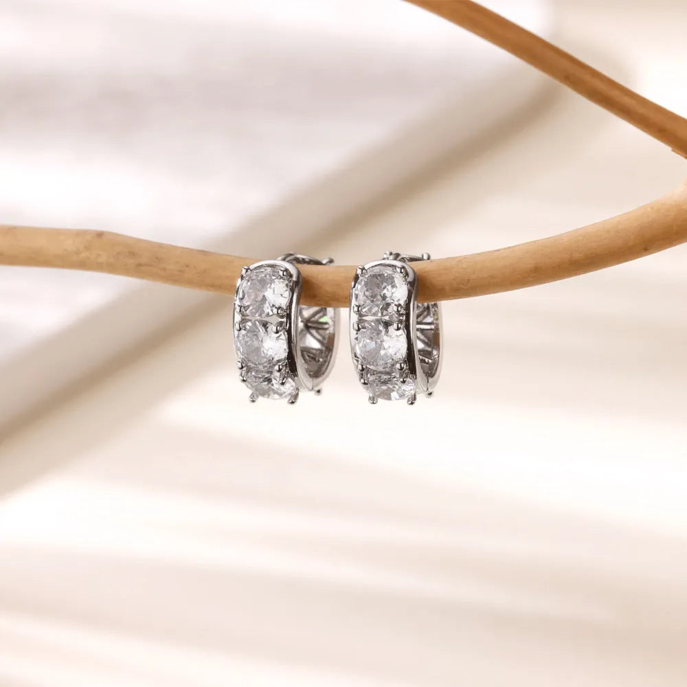 A pair of women's U-shaped clip-on earrings made from stainless steel with an inlaid zircon stone, in colour E5772P.