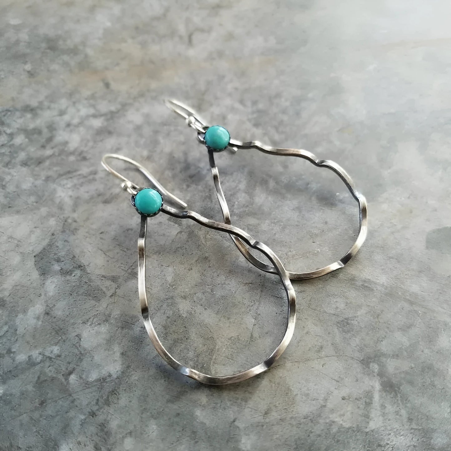 Geometric circle bohemian earrings with antique silver finish and turquoise accents