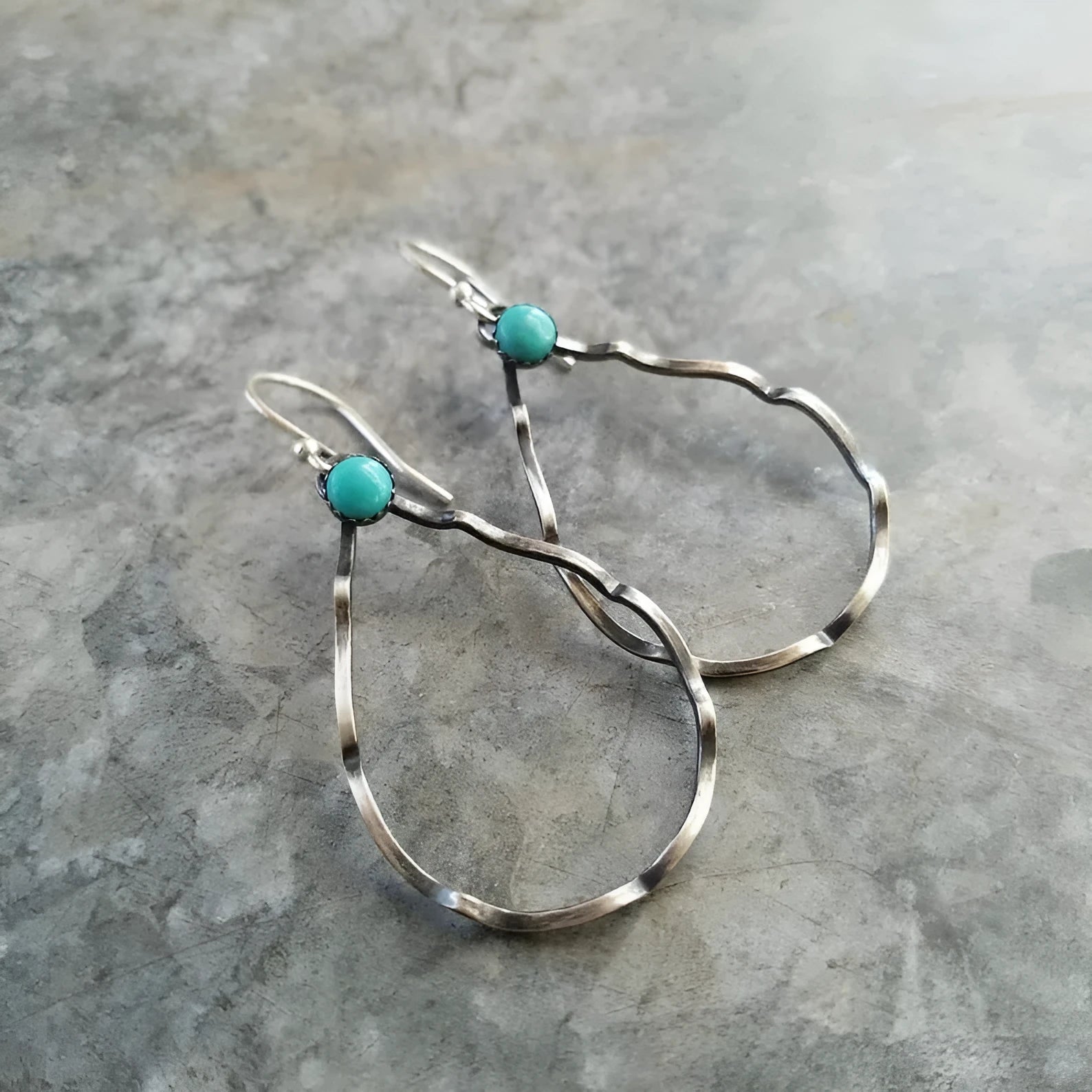 Geometric circle bohemian earrings with antique silver finish and turquoise accents