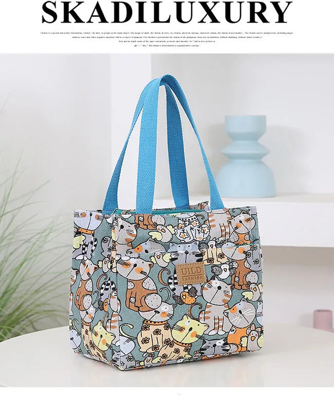 Women's portable printed canvas bag in horizontal square shape with floral design, showing reinforced base and large capacity.