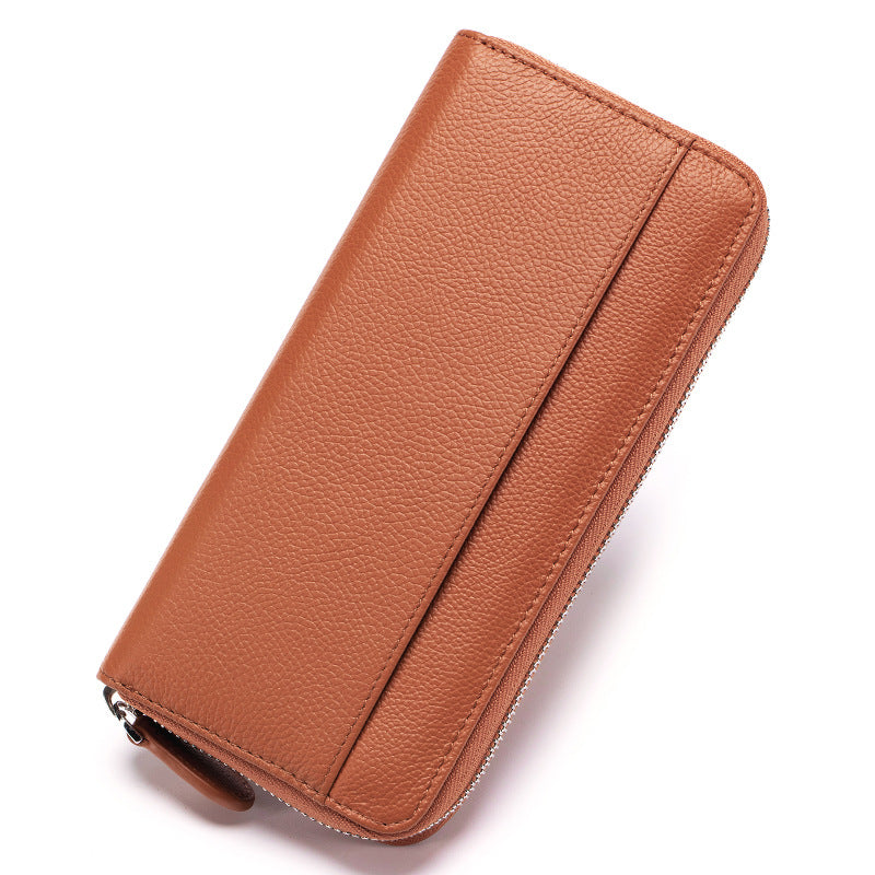 Long high-grade large-capacity wallet for women, crafted from genuine leather with 12 card slots, 2 bill compartments, and a coin zip pocket for organised storage and anti-theft card swiping protection.