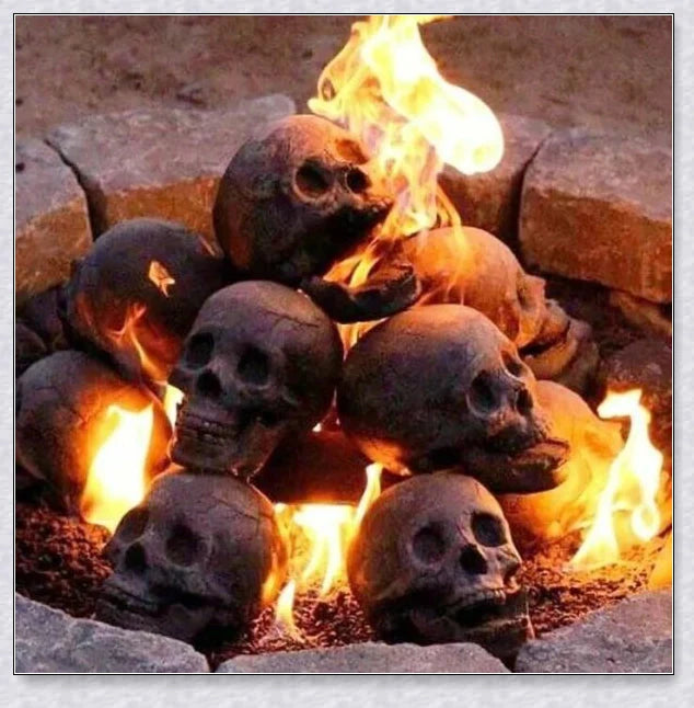 Terrifying human skull fire pit with flames escaping from the eyes and nose, perfect for outdoor gatherings and Halloween celebrations