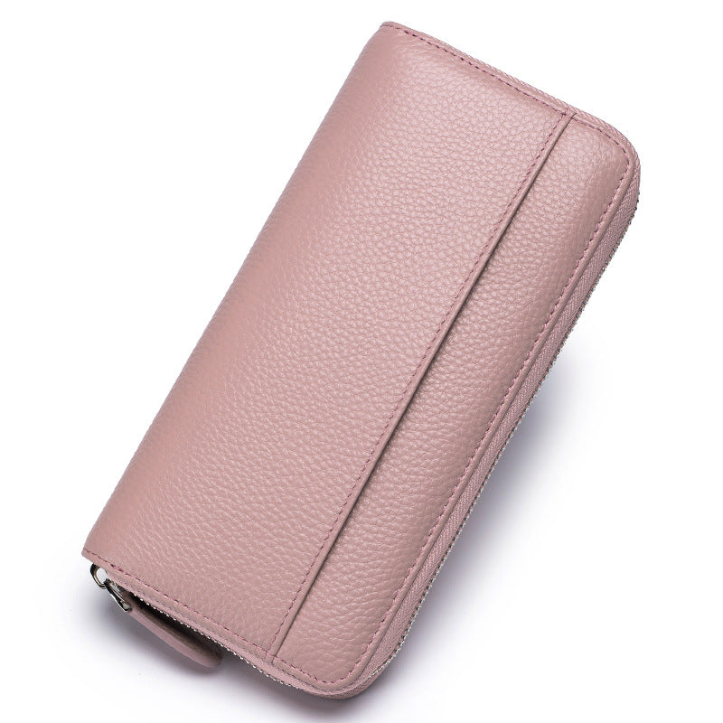 Long high-grade large-capacity wallet for women, crafted from genuine leather with 12 card slots, 2 bill compartments, and a coin zip pocket for organised storage and anti-theft card swiping protection.