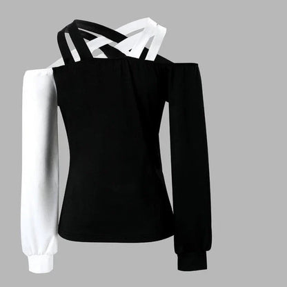 A stylish women's top with a black and white patchwork design, featuring a cross-belt accent for a fashionable casual look.