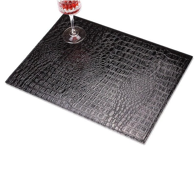Crocodile skin texture eco-leather coaster in black color, designed to protect furniture and add a stylish touch to home decor.