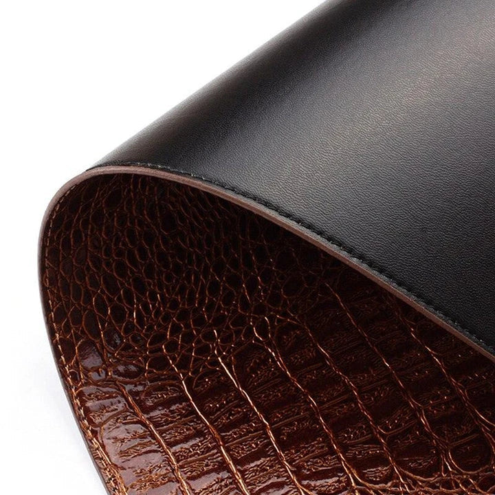 Crocodile skin texture eco-leather coaster in black color, designed to protect furniture and add a stylish touch to home decor.