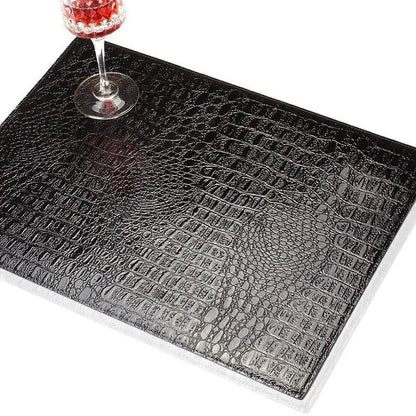 Crocodile skin texture eco-leather coaster in black color, designed to protect furniture and add a stylish touch to home decor.