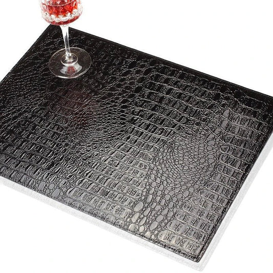 Crocodile skin texture eco-leather coaster in black color, designed to protect furniture and add a stylish touch to home decor.