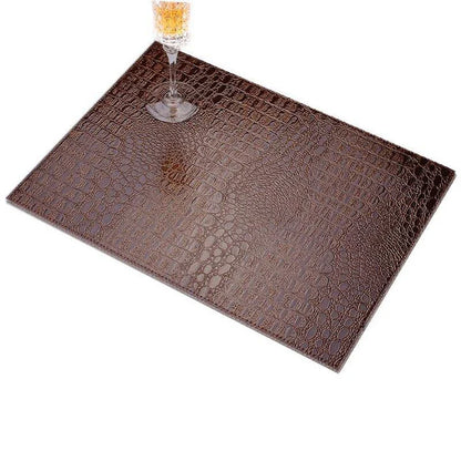 Crocodile skin texture eco-leather coaster in black color, designed to protect furniture and add a stylish touch to home decor.