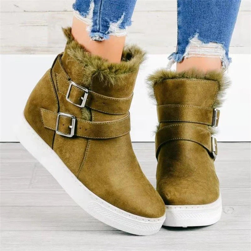 Flat short boots for women in various colors, featuring a suede upper, rubber sole, and wedge heel design