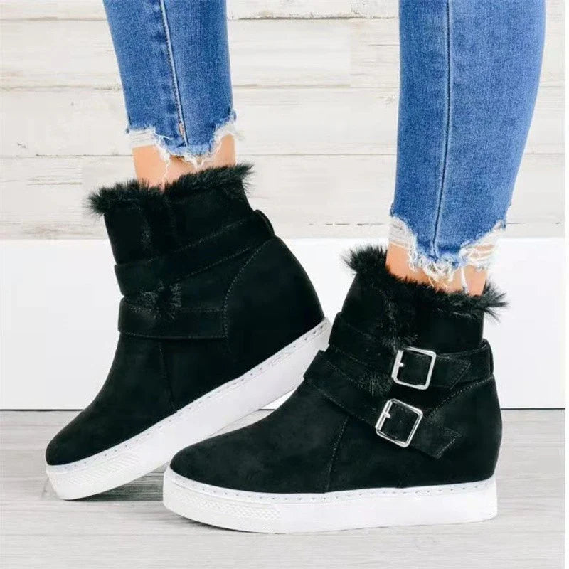 Flat short boots for women in various colors, featuring a suede upper, rubber sole, and wedge heel design