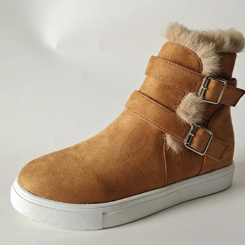 Flat short boots for women in various colors, featuring a suede upper, rubber sole, and wedge heel design