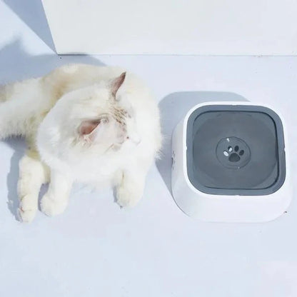 A floating pet drinking bowl with a large capacity and innovative design to prevent spills and promote dental health for your furry friend.