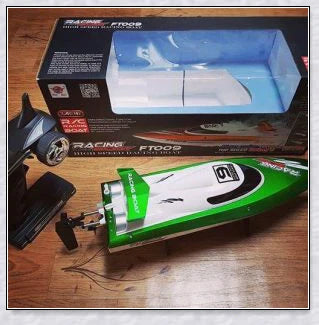 Remote-controlled RC Speed Turbo Racing Boat with a high-intensity propeller and compact, streamlined design for high-speed performance on the water