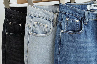 Premium cotton denim jeans with double-knee design and rolled edge detail for enhanced durability and modern style