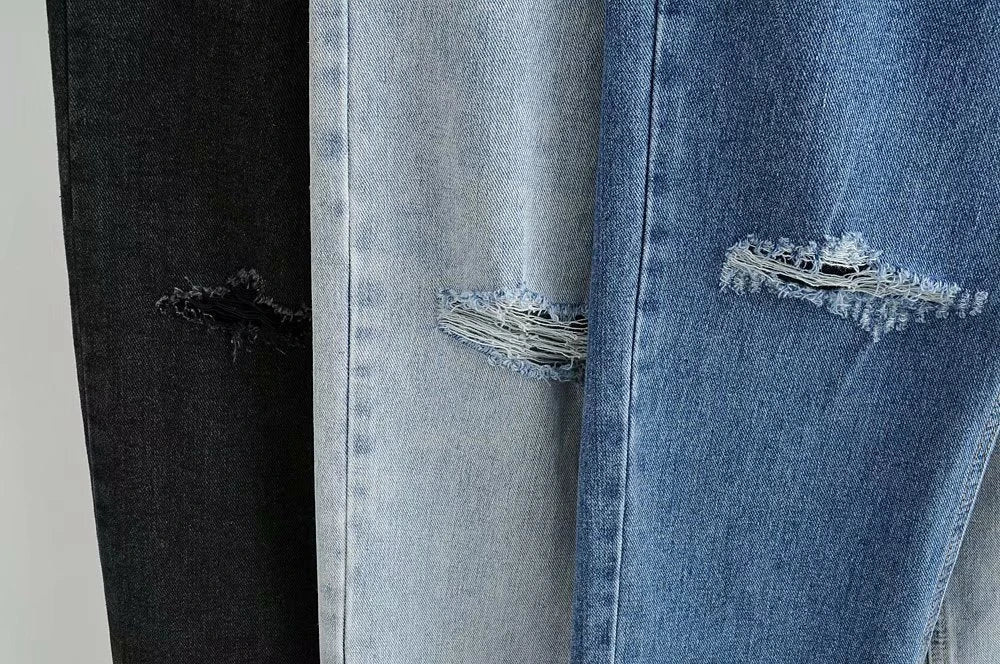 Premium cotton denim jeans with double-knee design and rolled edge detail for enhanced durability and modern style