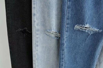 Premium cotton denim jeans with double-knee design and rolled edge detail for enhanced durability and modern style