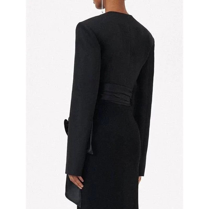 A stylish, slimming coat with a unique spliced design and lace-up accents, perfect for adding elegance and comfort to any outfit.