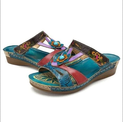 Stylish and comfortable ethnic-inspired wedge slippers with a fish mouth design, available in various colors.