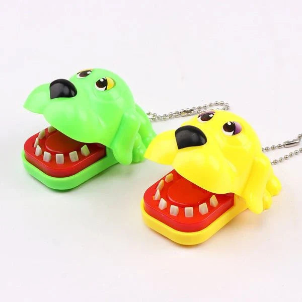 A realistic-looking shark-shaped biting finger toy that provides a satisfying snap when pressed down on.