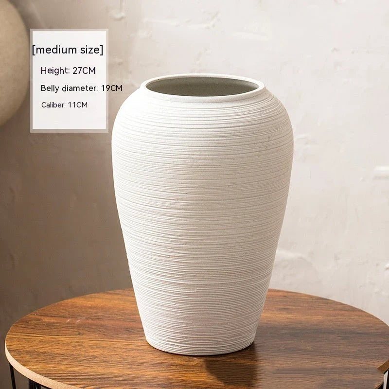 Minimalist Nordic-style table vase with dried flowers or hydroponic display for a serene and elegant home decor accent