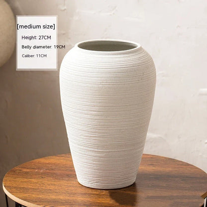 Minimalist Nordic-style table vase with dried flowers or hydroponic display for a serene and elegant home decor accent