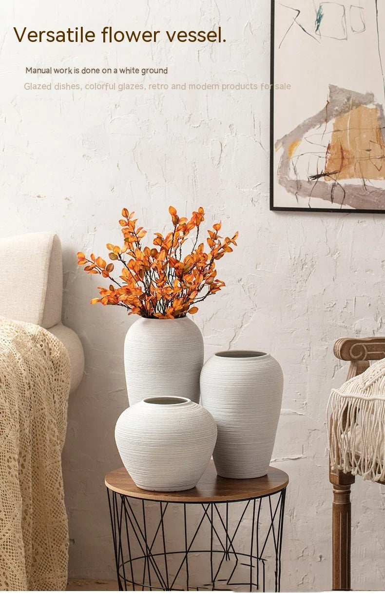 Minimalist Nordic-style table vase with dried flowers or hydroponic display for a serene and elegant home decor accent