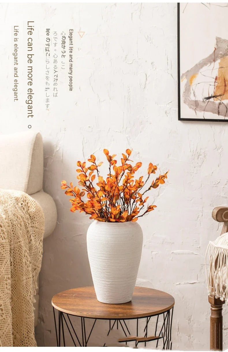 Minimalist Nordic-style table vase with dried flowers or hydroponic display for a serene and elegant home decor accent