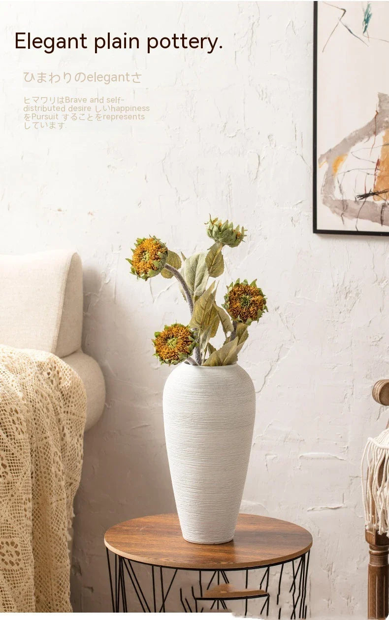 Minimalist Nordic-style table vase with dried flowers or hydroponic display for a serene and elegant home decor accent