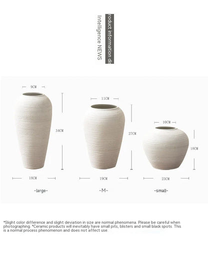 Minimalist Nordic-style table vase with dried flowers or hydroponic display for a serene and elegant home decor accent