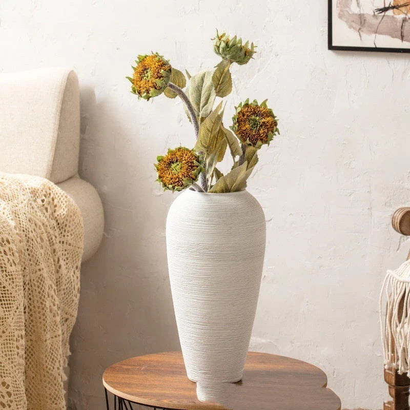 Minimalist Nordic-style table vase with dried flowers or hydroponic display for a serene and elegant home decor accent