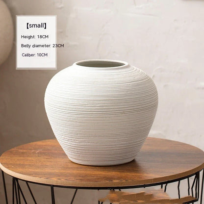 Minimalist Nordic-style table vase with dried flowers or hydroponic display for a serene and elegant home decor accent