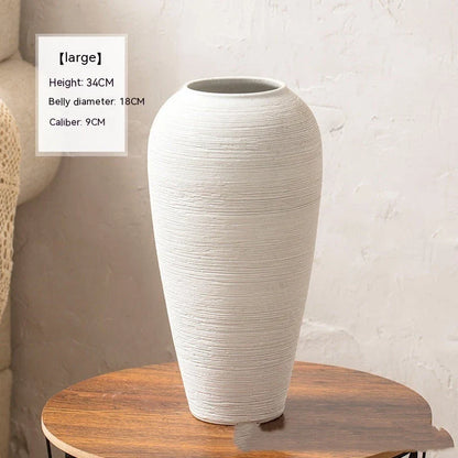 Minimalist Nordic-style table vase with dried flowers or hydroponic display for a serene and elegant home decor accent