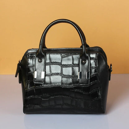 A stylish and functional cowhide leather women's shoulder bag with a unique crocodile pattern design