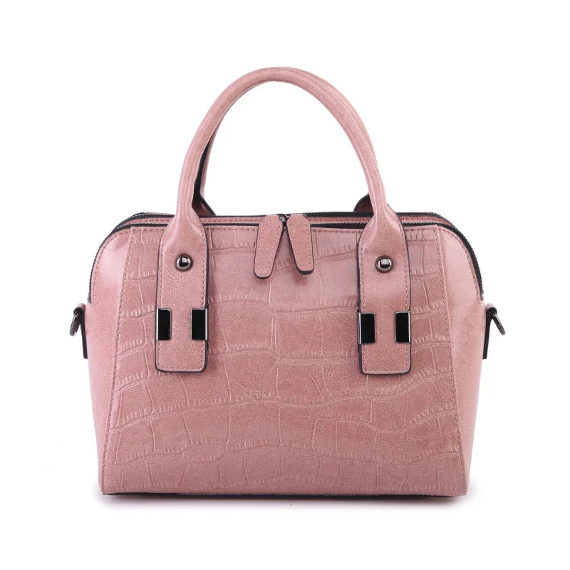 A stylish and functional cowhide leather women's shoulder bag with a unique crocodile pattern design