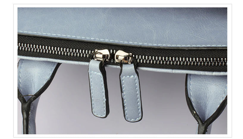 A stylish and functional cowhide leather women's shoulder bag with a unique crocodile pattern design