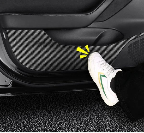 4 Pieces of Carbon Fiber Car Door Anti-Kick Pads Protecting a Tesla Model 3