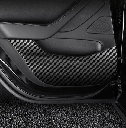 4 Pieces of Carbon Fiber Car Door Anti-Kick Pads Protecting a Tesla Model 3