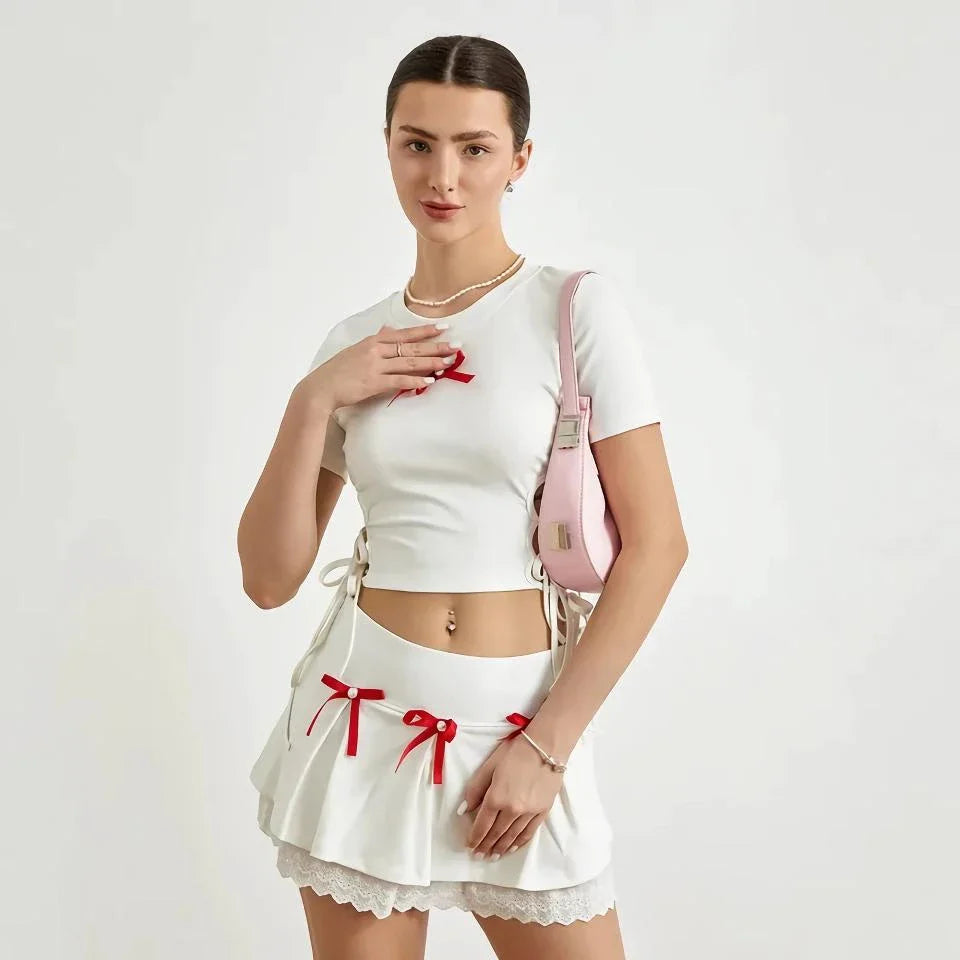 Cute lace 2-piece summer set with bandage t-shirt and mini skirt in white color