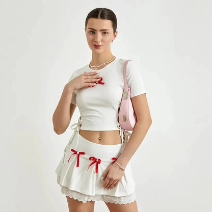 Cute lace 2-piece summer set with bandage t-shirt and mini skirt in white color