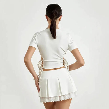 Cute lace 2-piece summer set with bandage t-shirt and mini skirt in white color