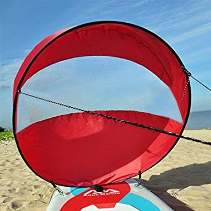 A high-quality, foldable sail designed for kayaks, canoes, and inflatable boats, providing a boost in speed and UV protection.