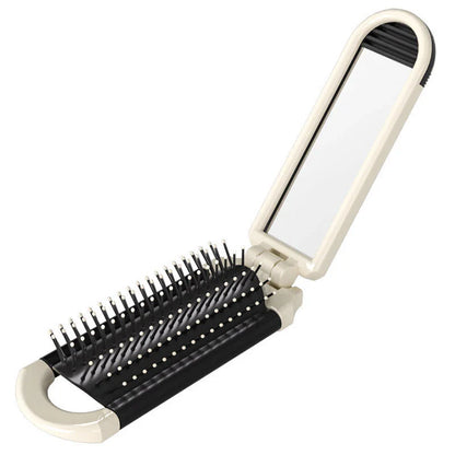 A portable, foldable hair brush with a built-in mirror for on-the-go grooming and touch-ups