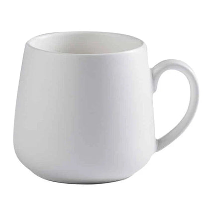 A modern, matte-textured ceramic coffee mug in a variety of colors, with a comfortable handle and generous 10.82 oz capacity.