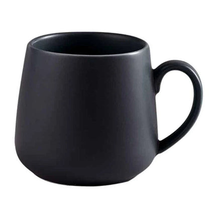 A modern, matte-textured ceramic coffee mug in a variety of colors, with a comfortable handle and generous 10.82 oz capacity.
