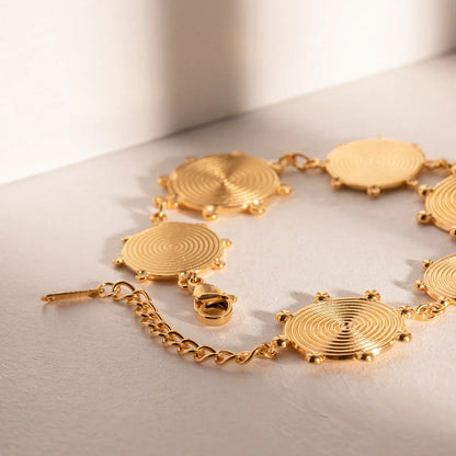 Elegant 18K gold plated stainless steel bracelet with a retro palace-style design